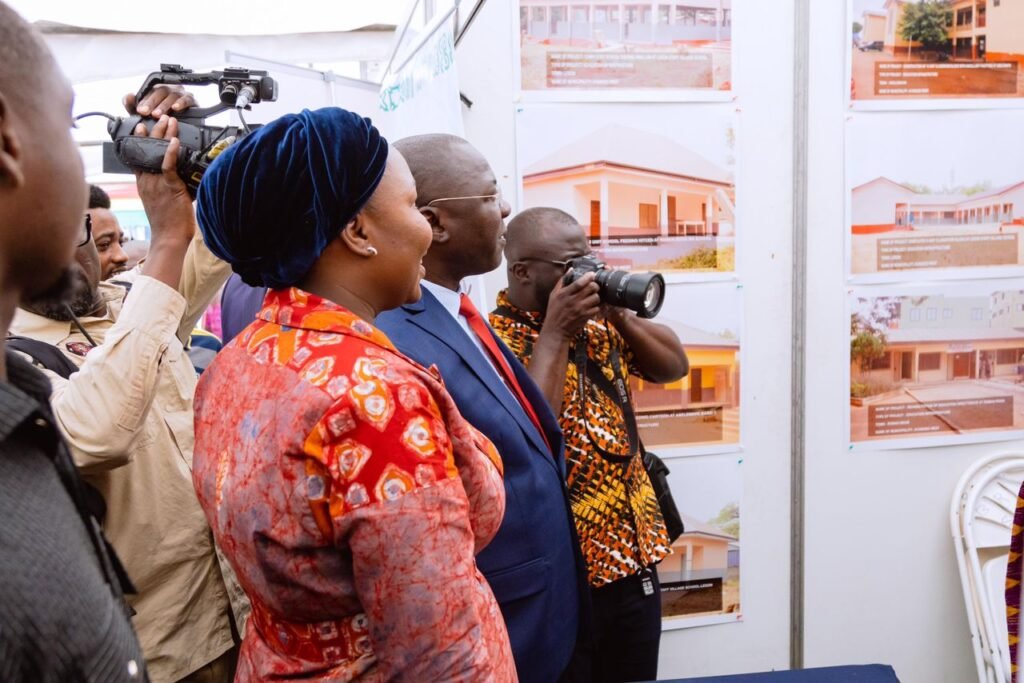 • Dr Mohammed Amin Adam (second
from left) and Ms Fatimatu Abubakar
inspecting one of the exhibition stands