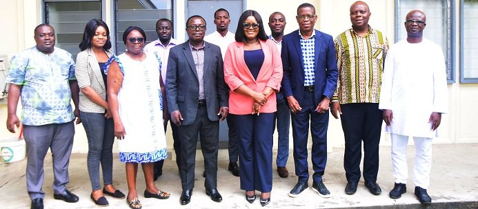 • Mr Martin Adu-Owusu (fourth from left) with Mrs Rose Appiah Okyere (fourh from right) and management staff of NTC and VLTC