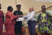 Ambassador Vibeke Pedersen (second from right) presenting the equipment to the minister, Naana Eyiah