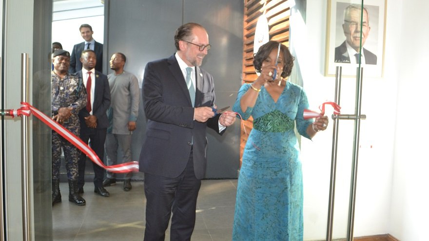 • Inset: Ms Shirley Ayorkor Botchwey being assisted by Mr Alexander Schallenberg to cut the tape for the official opening of the embassy Photo: Victor A. Buxton