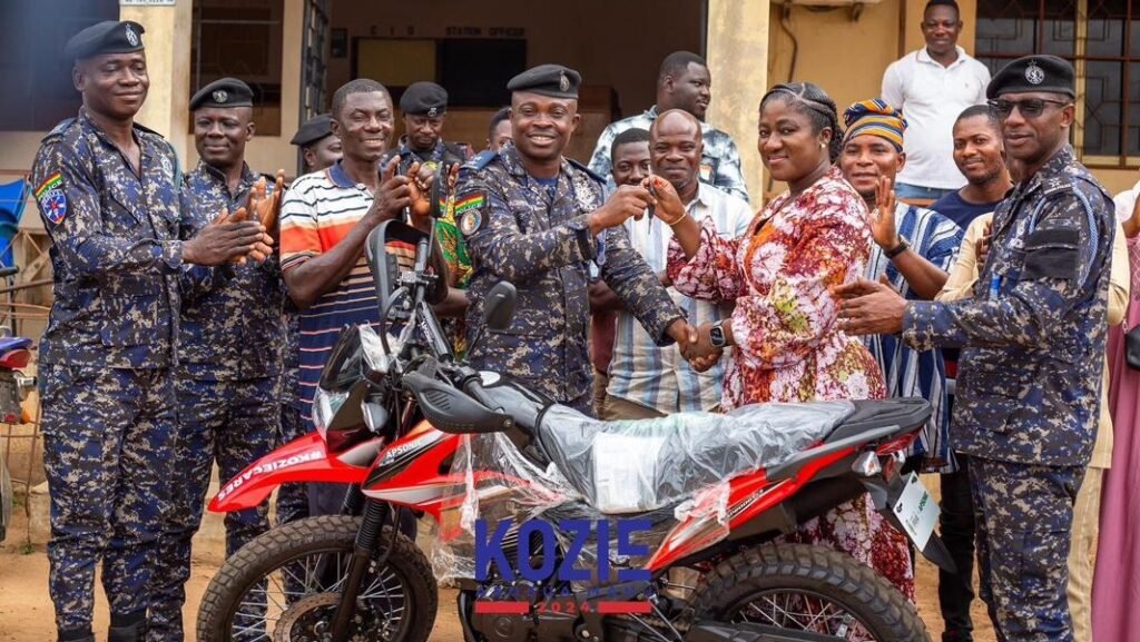 • Ms Akosua Asaa Manu presenting the keys of the motorcycles to Chief Superintendent Richard Boateng