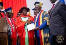 • Asantehene, Otumfuo Osei Tutu II (third from left) receiving his award at the programme