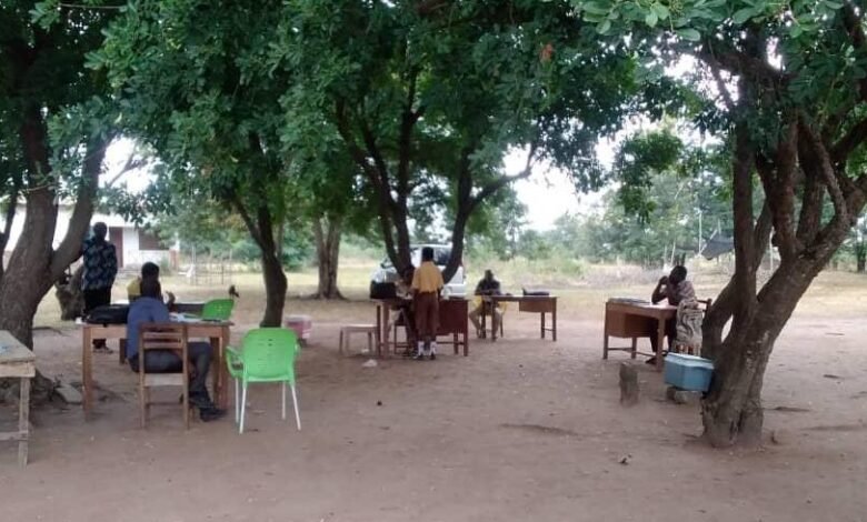 • Pupils sitting under shed