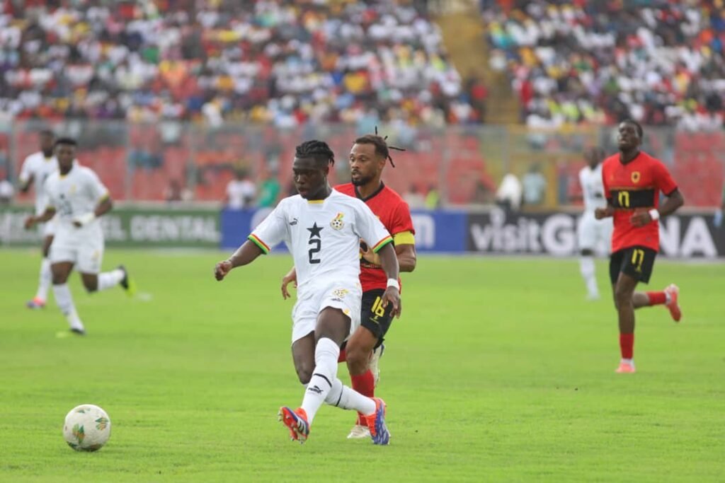 Black Stars defender Alidu Seidu battles for the ball with Skipper Alfredo Freddy during the game