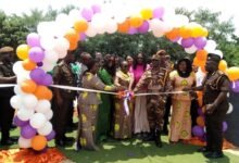 • DDP Edward Acquah (right), Dr Abena Asomaning (third from right), DDP Sophia Osei-Bonsu, and other stakeholders cutting the tape to inaugurate the facility