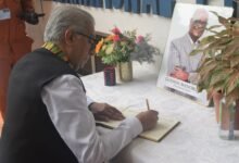 • Mr Ramesh Sadhwani signing the book of condolence Photo: Stephanie Birikorang