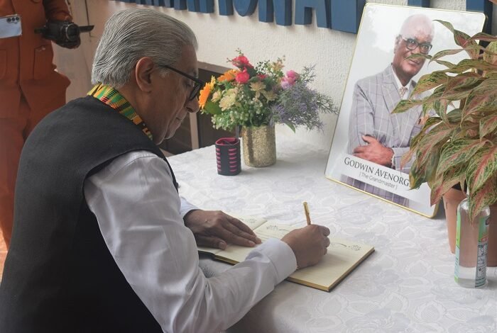 • Mr Ramesh Sadhwani signing the book of condolence Photo: Stephanie Birikorang