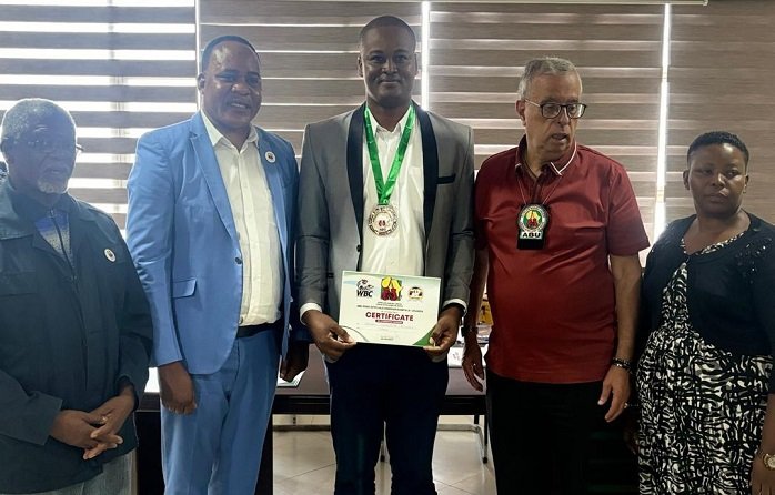 • Ghanaian official, Ishmael Classpeter Williams (middle) was among delegates at the convention. With him are Houicine Houichi (second right), Ms Maureen Mulangira, General Secretary of ABU(right) and others