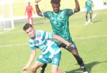 • Goalscorer Mohamed Azrida (in front) held in check by a Samartex defender in yesterday’s encounter Photo: Raymond Ackumey