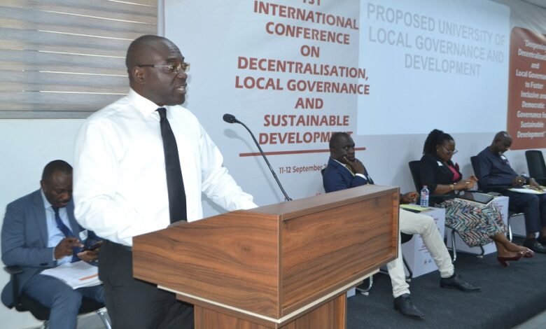 • Mr Martin Adjei-Mensah Korsah, speaking at the programme. With him are Prof. Nicholas Awortwi (second from left) and other dignitaries Photo: Victor A. Buxton