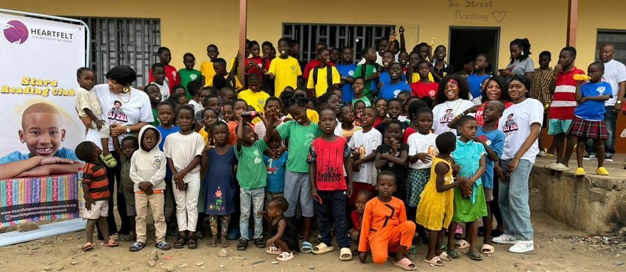 • Members of the HPN team with some of the children of the academy