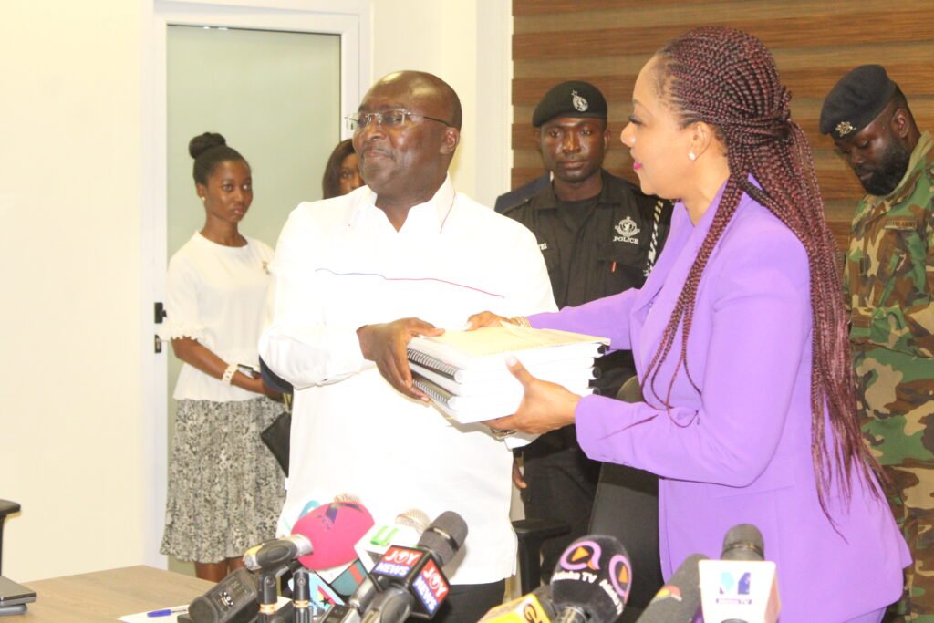 • Dr Bawumia (left), NPP presidential candidate, presenting his forms to Mrs Jean Mensa, EC Chairperson