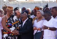 President Akufo-Addo (middle) being assisted by King Tackie Teiko Tsuru II, Ga Mantse (third from left) and other dignitaries to cut the tape to inaugurate the Jamestown Fishing Habour in Accra