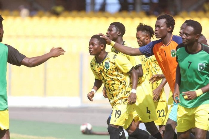 • Tweneboah (19) being mobbed by team mates after the goal Photo Raymond Ackumey