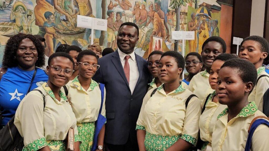 Dr Yaw Osei Adutwum (middle) with some of the students in the fair