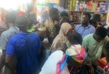 • Some parents purchasing books for their wards at the Makola market