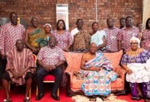 • Mr Addo (seated second left) with Osabarima Ababio III (seated second right) with other management staff from CBG Bank