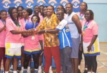 • Madam Toppar-Commodore (arrowed) presenting the female trophy to the skipper of Braves, Belinda Tawiah