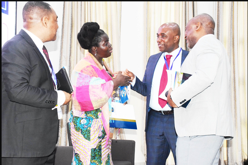 • Dr Efua Commeh (second from left) interacting with Prof. Kwaku Poku Asante (second from right).With them are Prof. Gordon Awandare (right) and Prof. Alfred Yawson,Provost ,CHS Photo: Seth Osabukle