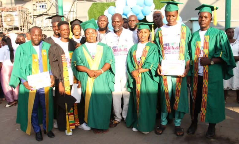 A section of the graduands with the CEO of the foundation in the middle