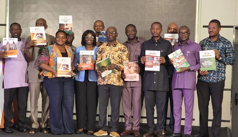 • Stakeholders displaying the WIP document at the event