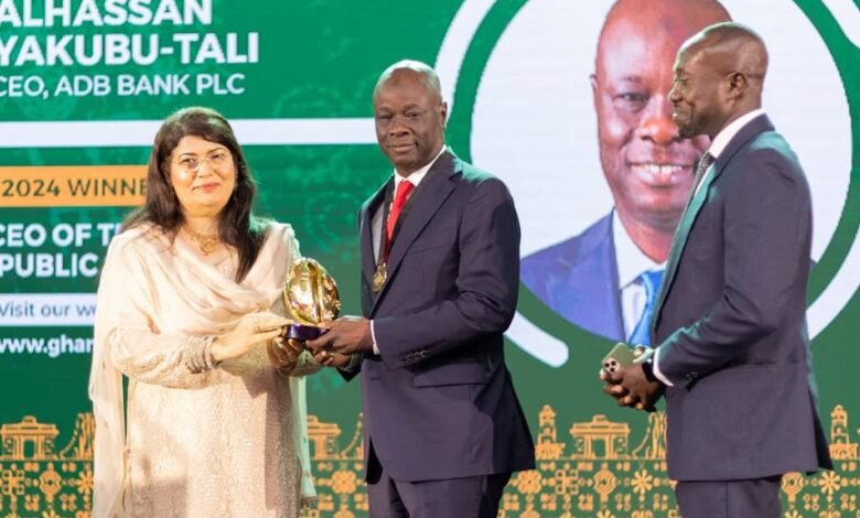 • Alhaji Alhassan Yakubu-Tali (middle) receiving his prize