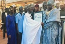 • Sheikh Mohammed Abubakar Mutawakil (right) receiving a citation