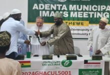 • Sheikh Mohammed Mutawakil Abubakari (right) presenting a certificate to one of the participants