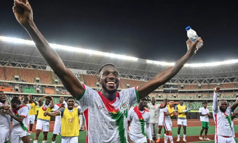 • Burkina Faso players celebrating their qualification after the victory