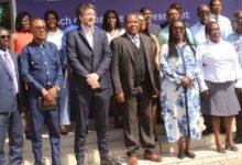 • Dr Mohammed Amin Adam (seventh from right), Emeritus Professor Aryeetey (sixth from right) with participants after the programme Photo: Ebo Gorman