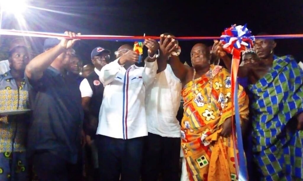• Dr Mahamudu Bawumia (middle) being assisted by Dr Archibald Letsa (left), Mr Divine K. Bosson and Togbe Ayim to open the office
