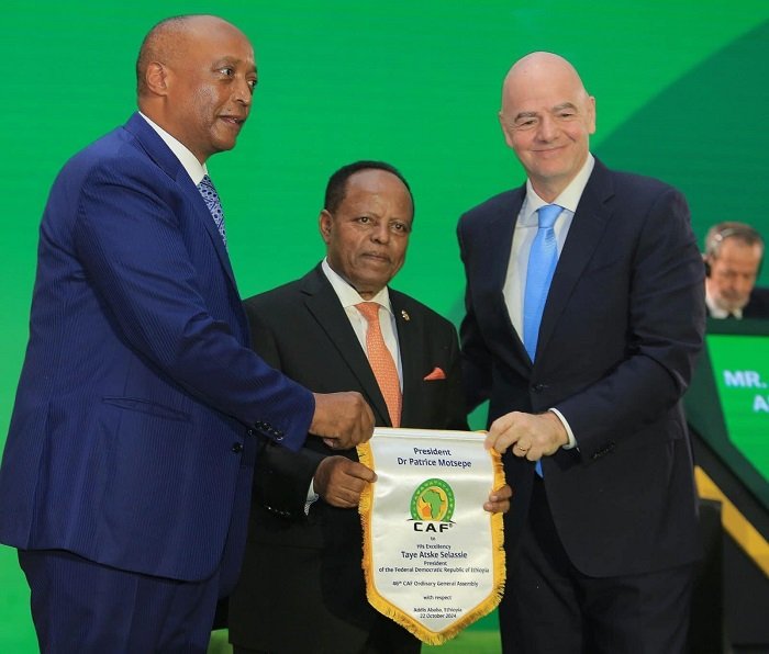 • Ethiopian president Taye Atske Selassie (middle) flanked by CAF president Dr Patrice Motsepe (left) and FIFA president Gianni Infantino