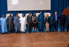 • Dr Maxwell Opoku-Afari (seated right) making a s• tDatiegmneitnatr iaets t haef tperro tghream lamuen c Phhoto