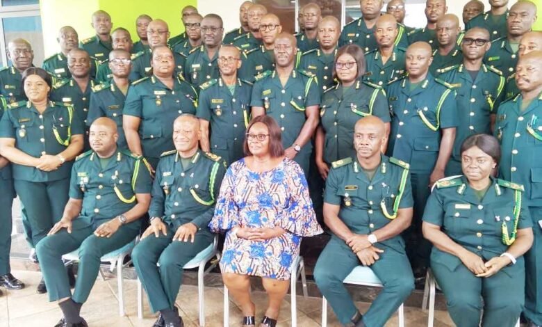 • Naana Eyiah Quansah (third from left) with Comptroller-General of GIS, Kwame Asuah Takyi (second from left), management and regional commanders