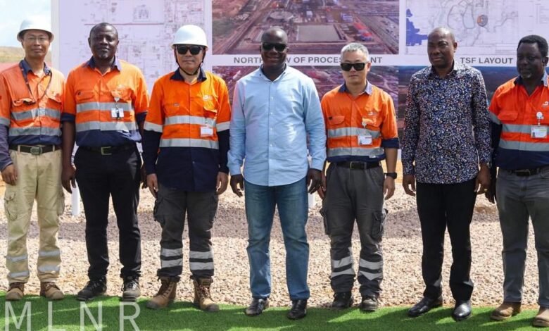 • Mr Samuel Abu Jinapor (middle) with officials of the company