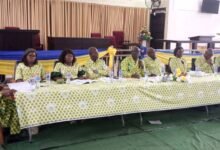 • Mr Tetteh (middle) with other board members during the programme