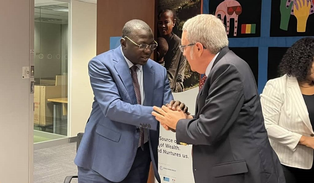 • Dr Mohammed Amin Adam (left) exchanging pleasantries with Robert Taliercio O’Brien, World Bank Country Director, Ghana, Liberia, and Sierra Leone