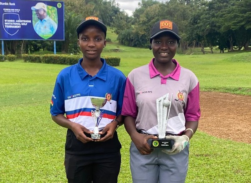 • Jennifer and Ayisha with their trophies