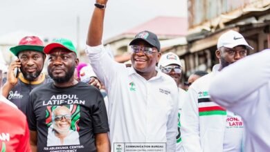 • Mr Abdul Latif Dan (middle) and some supporters in a walk