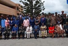 • Ms Ursula Owusu-Ekuful (middle) with dignitaries and participants