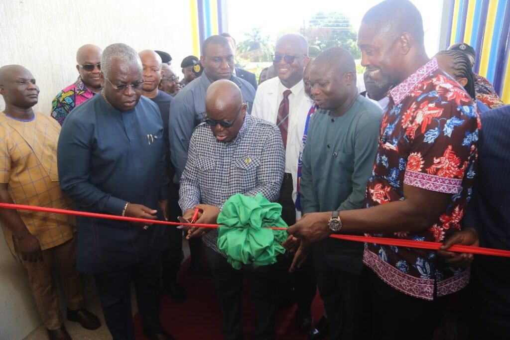 •&#xA;President Akufo-Addo (middle) cutting the tape to open the facility for use