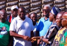 • Mr Isaac Adongo (second from right) handing over the rehabilitated classroom project to a representative of the Bolgatanga Municipal Assembly