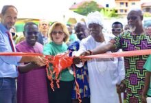 • Ms Mosara (third from left) being assisted by other dignitaries to cut the tape to commission the plant