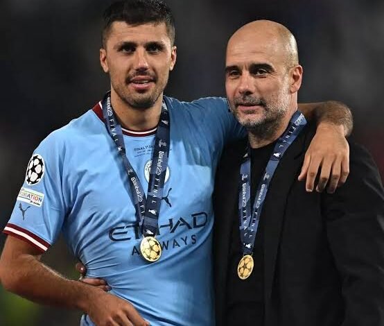 • Rodri (right) with Guardiola