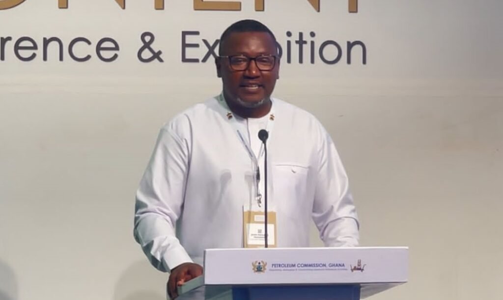 Mr Madama (inset) addressing participants in the conference