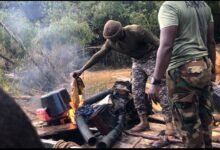 • The military setting some of the mining equipment on fire • The military men dismantling some of the mining equipment