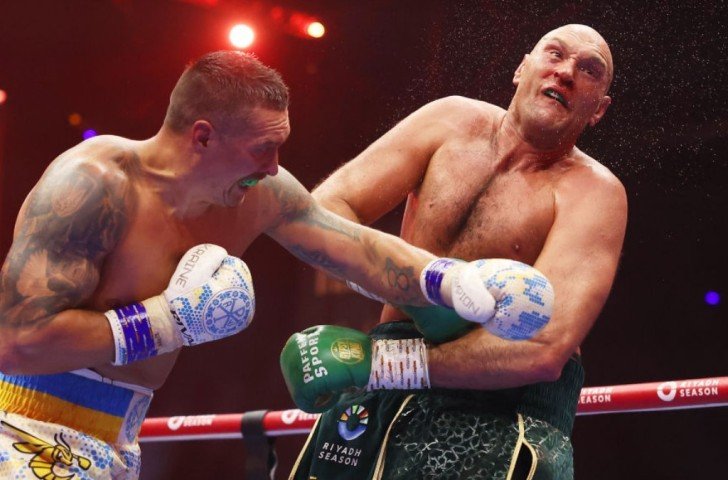 Tyson Fury (right) is convinced he would knock out Usyk in their rematch