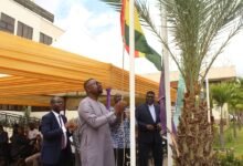 • Prof. Charles Mills-Robertson (right), Board chair, GSA, and other board members hoisting the flags to mark the World Standards Day celebration Photo: Ebo Gorman