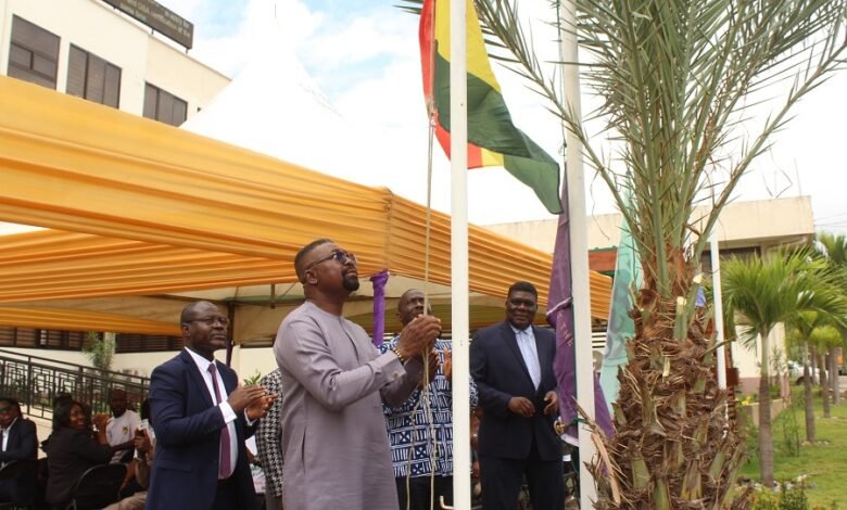 • Prof. Charles Mills-Robertson (right), Board chair, GSA, and other board members hoisting the flags to mark the World Standards Day celebration Photo: Ebo Gorman