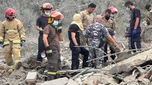 • Lebanon's civil defence team searches the rubble in Aitou, following an Israeli air strike